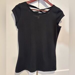 Ricki’s basic Black T-Shirt size medium with cross strap back detail